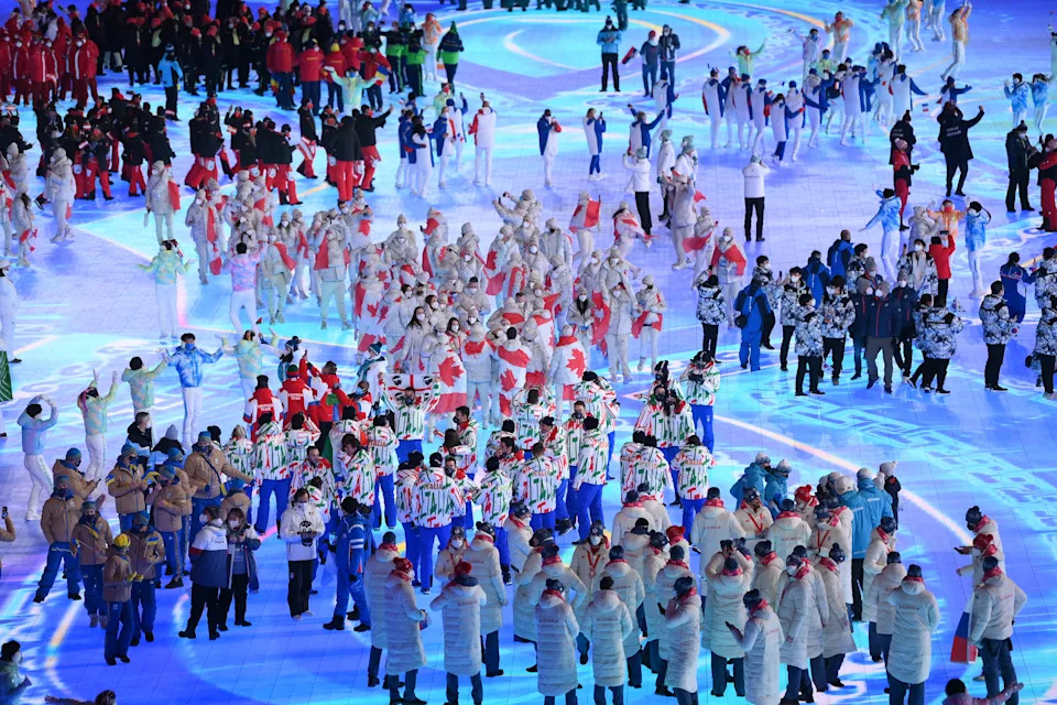BEIJING, CHINA - FEBRUARY 20: Members of Team Canada and Team Italy make their way around the Beijing National stadium during the Beijing 2022 Winter Olympics Closing Ceremony on Day 16 of the Beijing 2022 Winter Olympics at Beijing National Stadium on February 20, 2022 in Beijing, China. (Photo by David Ramos/Getty Images)