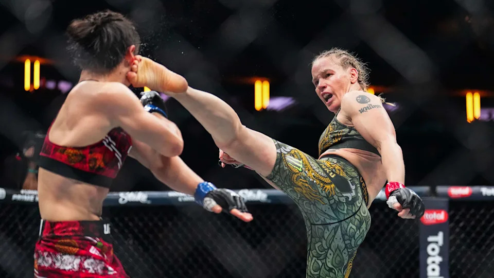 NEW YORK, NEW YORK - NOVEMBER 15: (R-L) Valentina Shevchenko of Kyrgyzstan kicks Zhang Weili of China in the UFC flyweight championship fight during the UFC 322 event at Madison Square Garden on November 15, 2025 in New York City. (Photo by Chris Unger/Zuffa LLC)