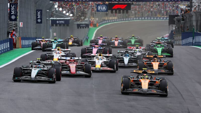 Lando Norris (McLaren-Mercedes) leads into the first corner at the start of the 2025 Brazilian Grand Prix