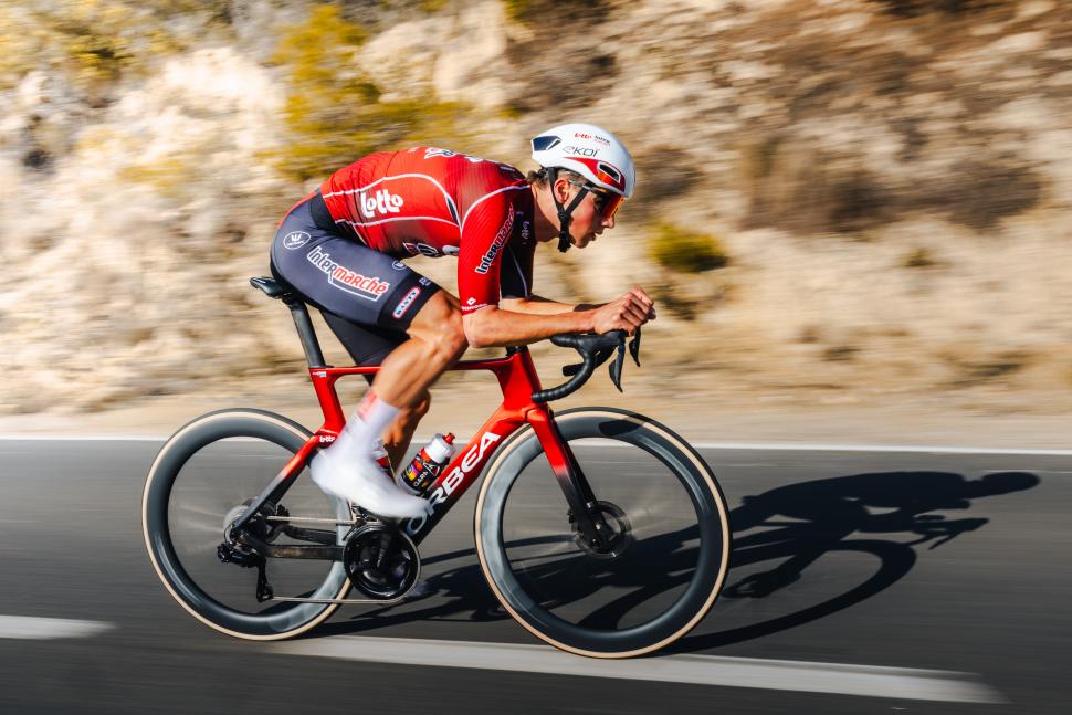 2026 Lotto Intermarche Orbea Orca Aero riding driveside 