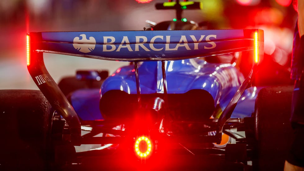rear view of a formula 1 car with illuminated lights rear view of a formula 1 car with illuminated lights