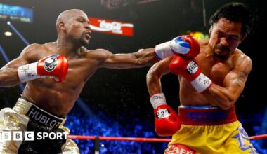Floyd Mayweather throws a punch at Manny Pacquiao during their welterweight unification championship bout in May 2015 at MGM Grand Garden Arena in Las Vegas