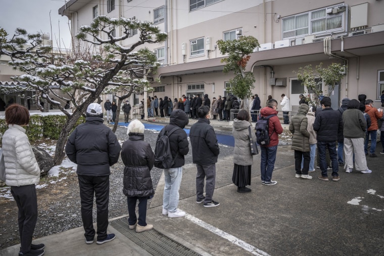 People queue up at a polling station in Kawasaki, Kanagawa prefecture.