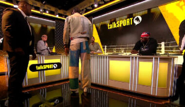 Watch how Deontay Wilder was restrained by security after Tyson Fury question