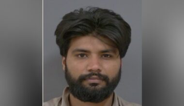 Police released headshot of a man with straight black hair and balck full beared against a plain background