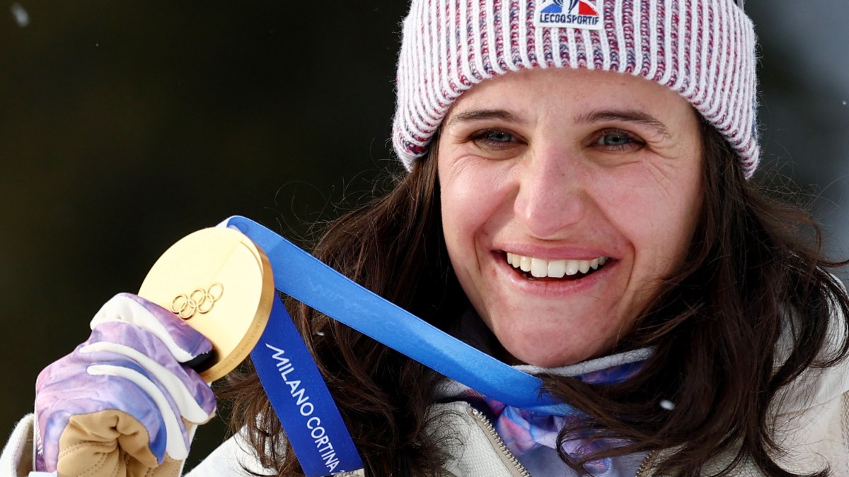 Biathlete who stole from team-mate wins second Olympic gold