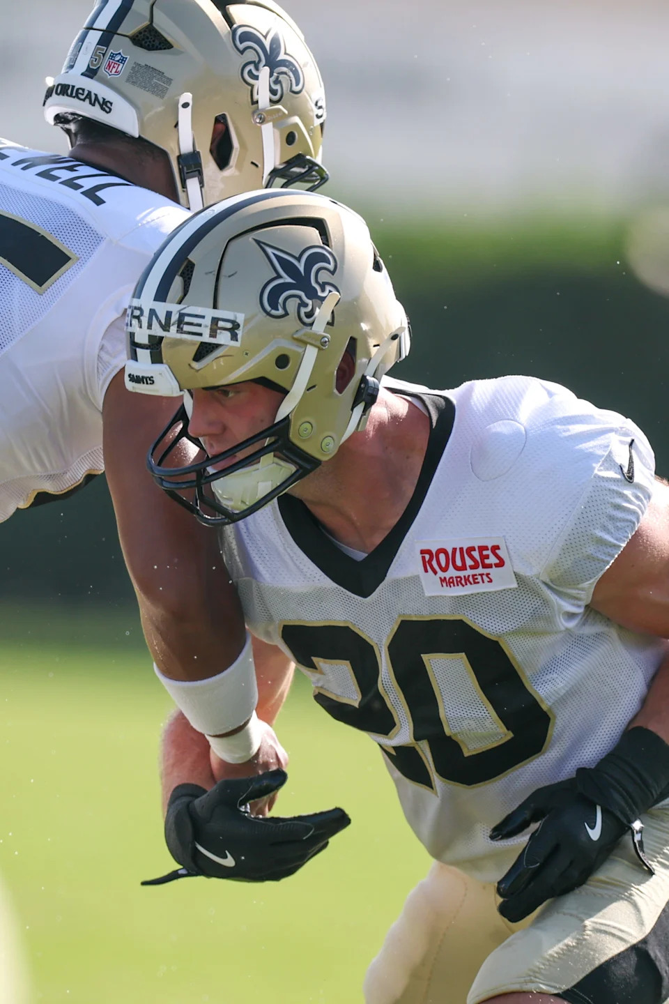 Jul 28, 2025; Metairie, LA, USA; New Orleans Saints linebacker Pete Werner (20) on ball drills during training camp at Ochsner Sports Performance Center. Mandatory Credit: Stephen Lew-Imagn Images