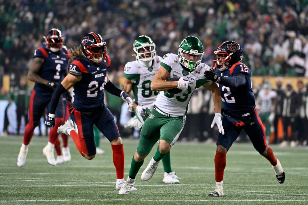 Fred Greenslade / THE CANADIAN PRESS FILES
Saskatchewan Roughriders receiver Tommy Nield carries the ball against Montreal Alouettes’ Najee Murray during the 112th Grey Cup, in Winnipeg last November. Nield, a 26-year-old from Guelph, Ont., recently signed a two-year deal with the Winnipeg Blue Bombers in free agency.