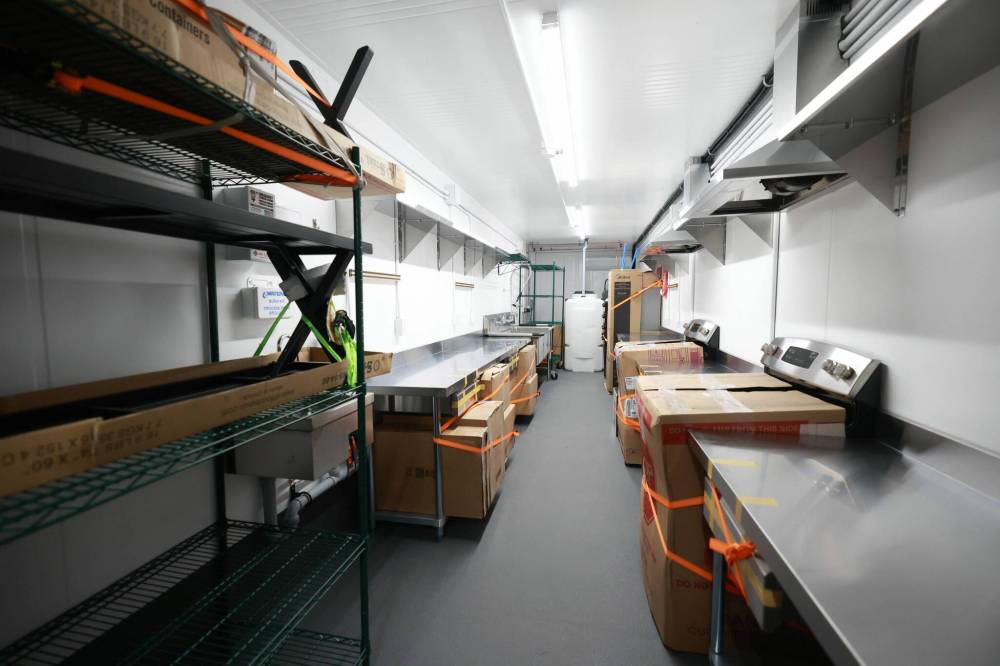 Ruth Bonneville / Free Press
Some of NIBI Enviro Tech’s containers are being made into commercial kitchens to be shipped to northern communities for teaching facilities.