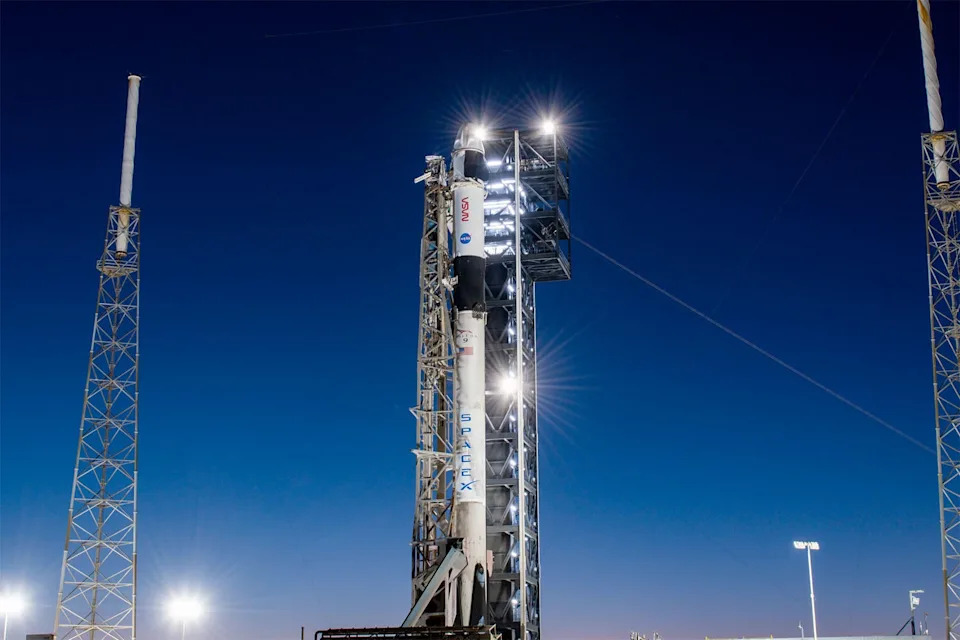 A SpaceX Falcon 9 rocket stands poised for launch Wednesday atop pad 40 at the Cape Canaveral Space Force Station to send a two-woman, two-man crew to the International Space Station. / Credit: SpaceX