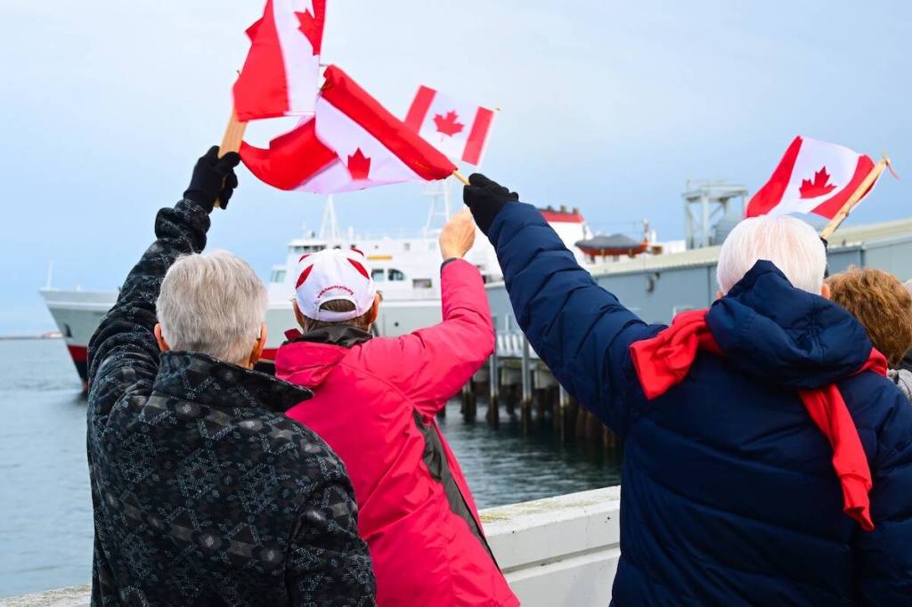 Port Angeles residents welcome passengers from Victoria as they disembark from the Coho&rsquo;s first sailing of the year in February 2025. (Courtesy of Port Angeles Waterfront District)