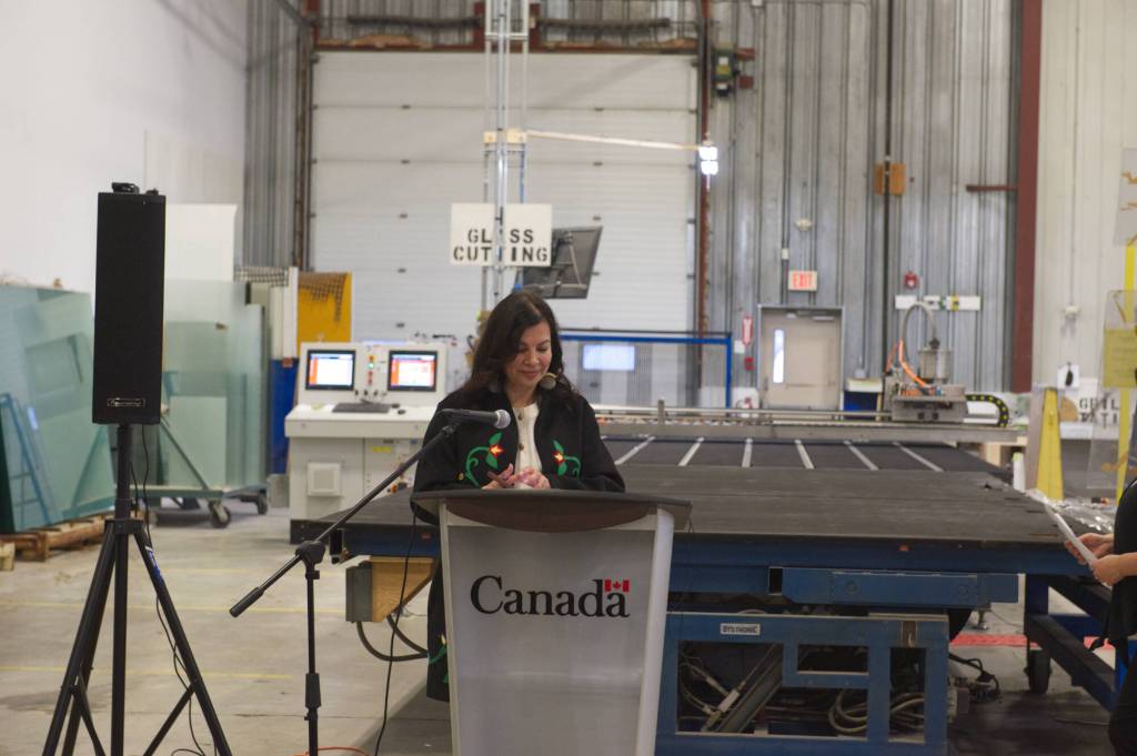 Northern Affairs Minister Rebecca Chartrand announces $2.3 million for three Yukon manufacturing projects aimed at boosting housing capacity during an event at Northerm Windows and Doors in Whitehorse on Feb. 19, 2026. (Jake Howarth/Yukon News)