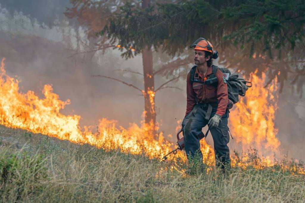 A B.C. Wildfire Service firefighter works on the McDougall Creek Fire in West Kelowna in 2023. (Photo courtesy B.C. Wildfire Service)