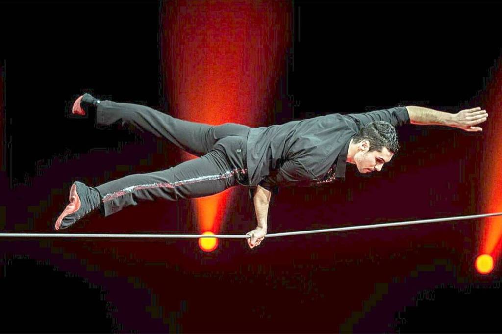 Geoffrey Berhault is a second-generation circus performer specializing in the tight-wire. Part of the Europa Super Circus, Berhault combines dance, jumps, and flips on a 10 mm cable. (Image via supercircus.com)