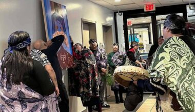 Carrielynn Victor helps install her new artwork with a CGH staffer at the gathering to honour Keegan Combes at CGH on Feb. 21, 2026. (Jennifer Feinberg/ Chilliwack Progress)