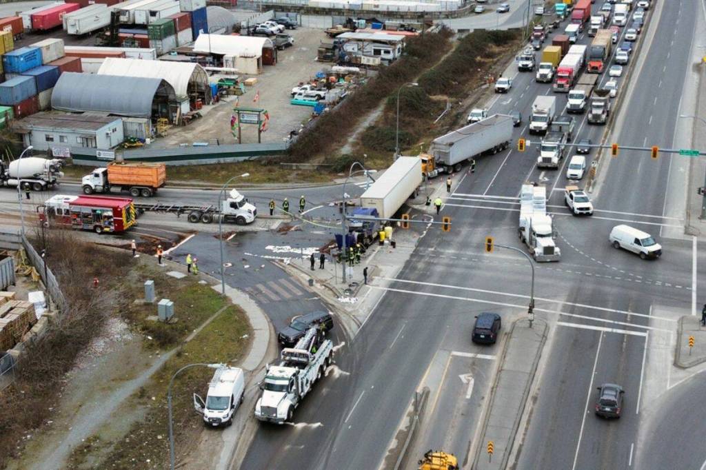 A semi-truck travelling westbound on Highway 17 in Surrey struck multiple light poles and a traffic light signal Feb. 25, 2026. (1st Due Media/ Contributed to Surrey Now-Leader)