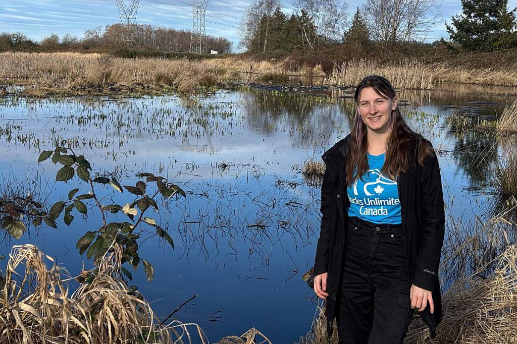 Megan Goard of Ducks Unlimited Canada at a restoration area in Surrey&rsquo;s Serpentine Wildlife Management Area, where the non-profit is highlighting its efforts for Invasive Species Awareness Week. (Grace McLeod/Peace Arch News)