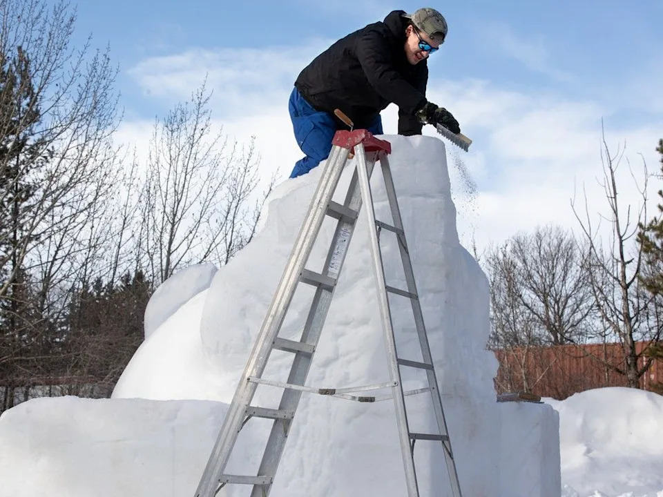  Team Wales’s Clive Redley works on a snow sculpture during the 36th annual Silver Skate Festival in Edmonton’s Laurier Park on Feb. 7. The festival continues until Feb. 16.