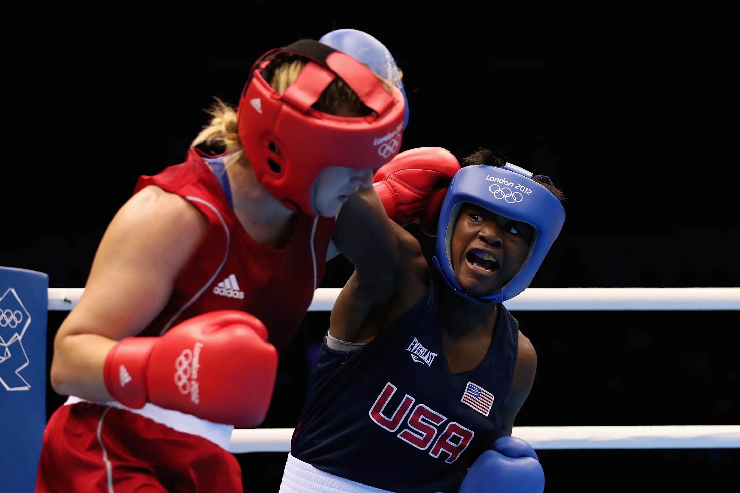 LONDON, ENGLAND - AUGUST 08:  Claressa Shields (R) of the United States in action against Marina Volnova of Kazakhstan during the Women's Middle (75kg) Boxing semifinals on Day 12 of the London 2012 Olympic Games at ExCeL on August 8, 2012 in London, England.  (Photo by Scott Heavey/Getty Images)