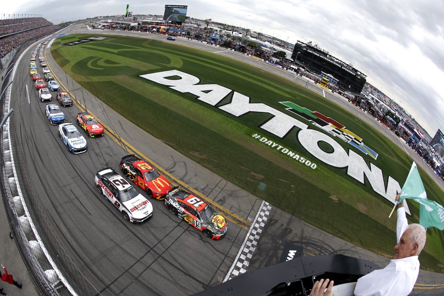 Chase Briscoe, driver of the #19 Bass Pro Shops Toyota leads the field to the green flag to start the NASCAR Cup Series Daytona 500 at Daytona International Speedway on February 16, 2025 in Daytona Beach, Florida. (Photo by Sean Gardner/Getty Images for NASCAR)