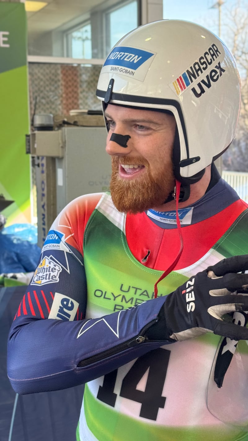 Olympian Jonny Gustafson wears the NASCAR logo on his luge helmet.