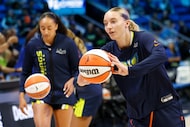 Dallas Wings guard Paige Bueckers (5) warms up before an WNBA basketball game against the...