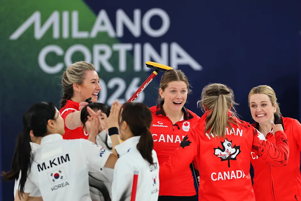 CORTINA D'AMPEZZO, ITALY - FEBRUARY 19: Rachel Homan, Tracy Fleury, Emma Miskew and Sarah Wilkes of Team Canada celebrate after winning the Women's Round Robin match between Team Canada and Team Republic of Korea on day thirteen of the Milano Cortina 2026 Winter Olympic games at Cortina Curling Olympic Stadium on February 19, 2026 in Cortina d'Ampezzo, Italy. (Photo by Carmen Mandato/Getty Images)
