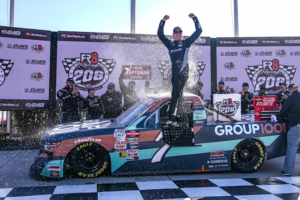 Feb 24, 2024; Hampton, Georgia, USA; NASCAR Craftsman Truck Series Driver Kyle Busch celebrates in victory lane after winning the Fr8 208 at Atlanta Motor Speedway. Mandatory Credit: David Yeazell-USA TODAY Sports© David Yeazell-Imagn Images
