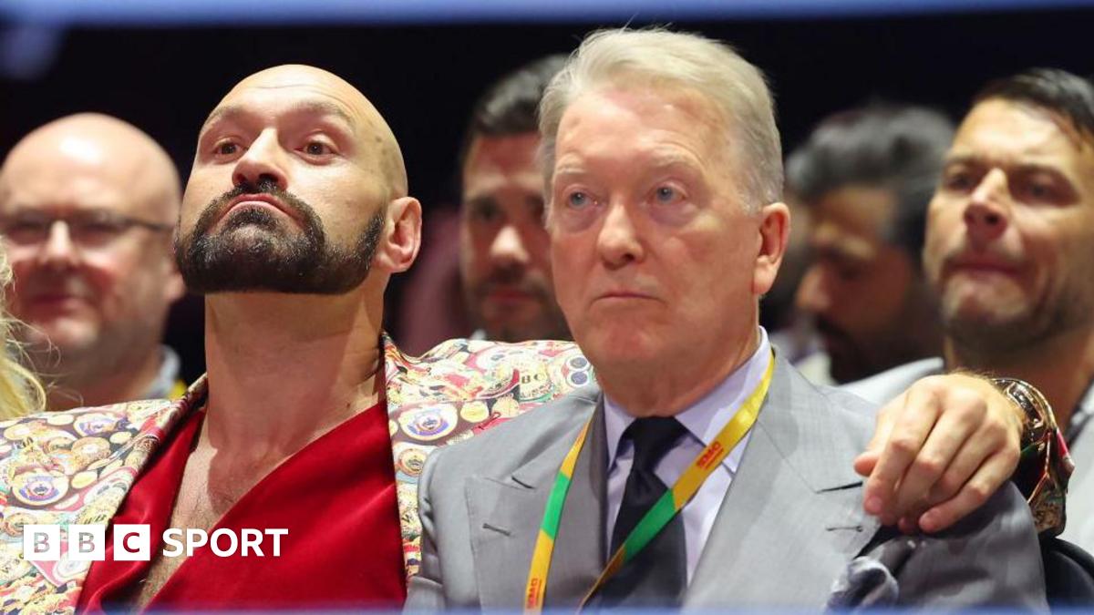 Tyson Fury has his arm around Frank Warren