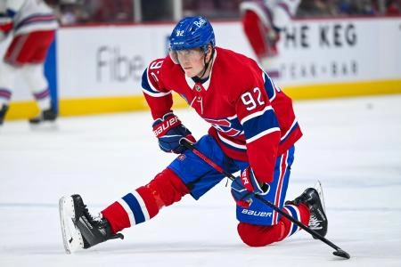 Jan 19, 2025; Montreal, Quebec, CAN; Montreal Canadiens right wing Patrik Laine (92) stretches during warm-up before the game against the New York Rangers at Bell Centre.