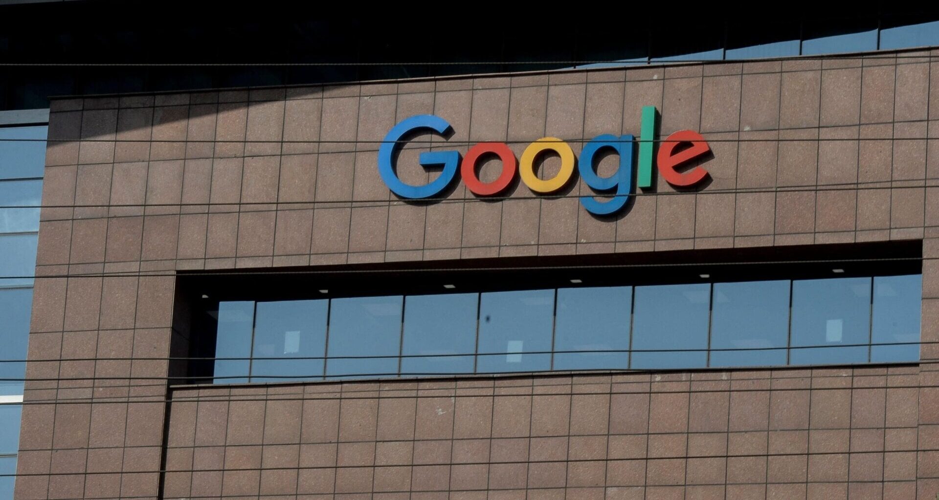 The Google logo is pictured on a Google office building