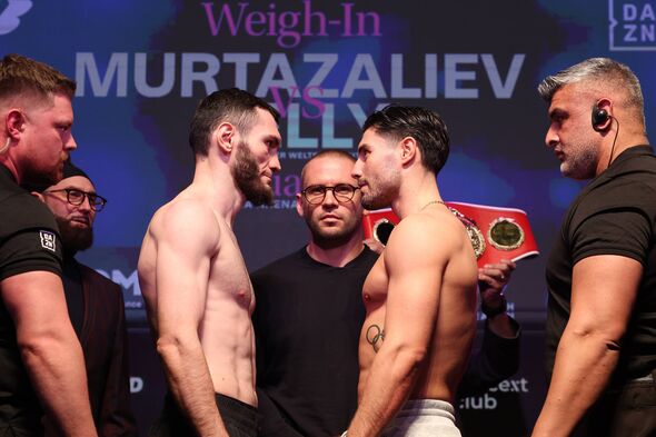 Bakhram Murtazaliev (black trousers) and Josh Kelly (grey trousers) Weigh In.