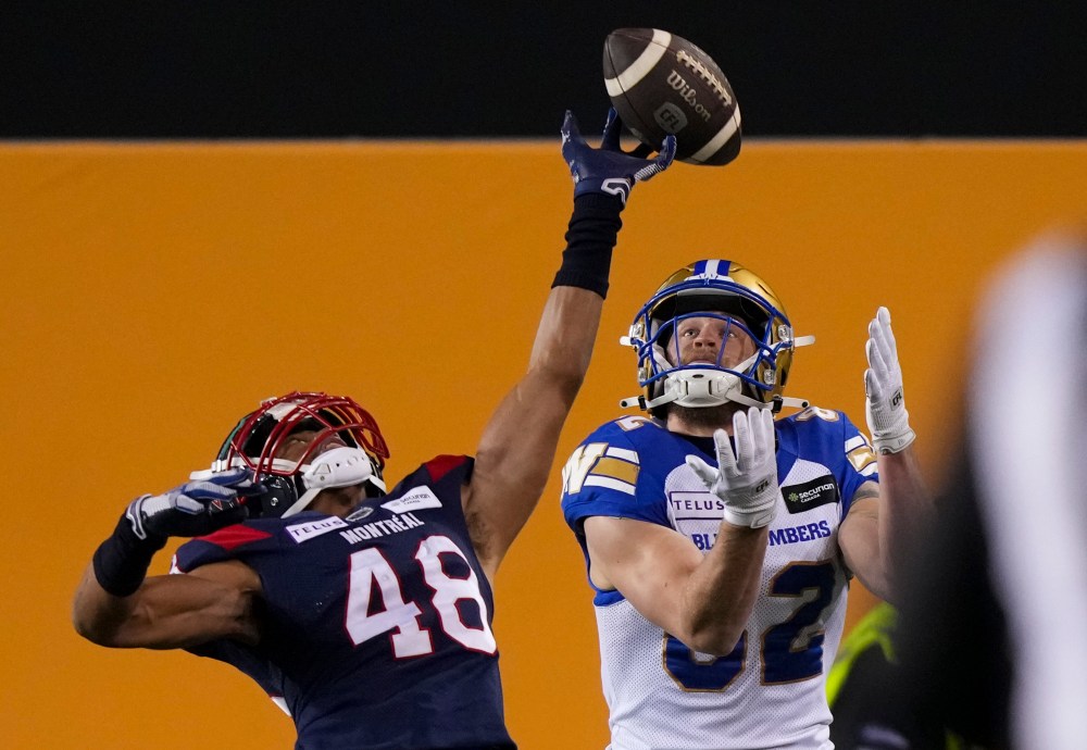 Montreal Alouettes defensive back Kabion Ento (48) knocks down a pass intended for Winnipeg Blue Bombers wide receiver Drew Wolitarsky (82) during the first half of football action at the 110th CFL Grey Cup in Hamilton, Ont., on Sunday, Nov. 19, 2023. The Montreal Alouettes signed American defensive back Ento to a two-year contract on Thursday, keeping him with the team through 2026.THE CANADIAN PRESS/Nathan Denette