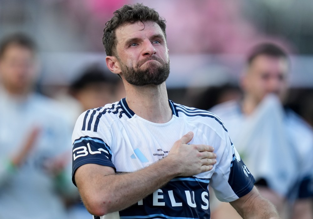 Vancouver Whitecaps' Thomas Muller shows his appreciation to Vancouver fans after Inter Miami defeated Vancouver during the MLS Cup final soccer match, in Fort Lauderdale, Fla., on Saturday, December 6, 2025. THE CANADIAN PRESS/Darryl Dyck