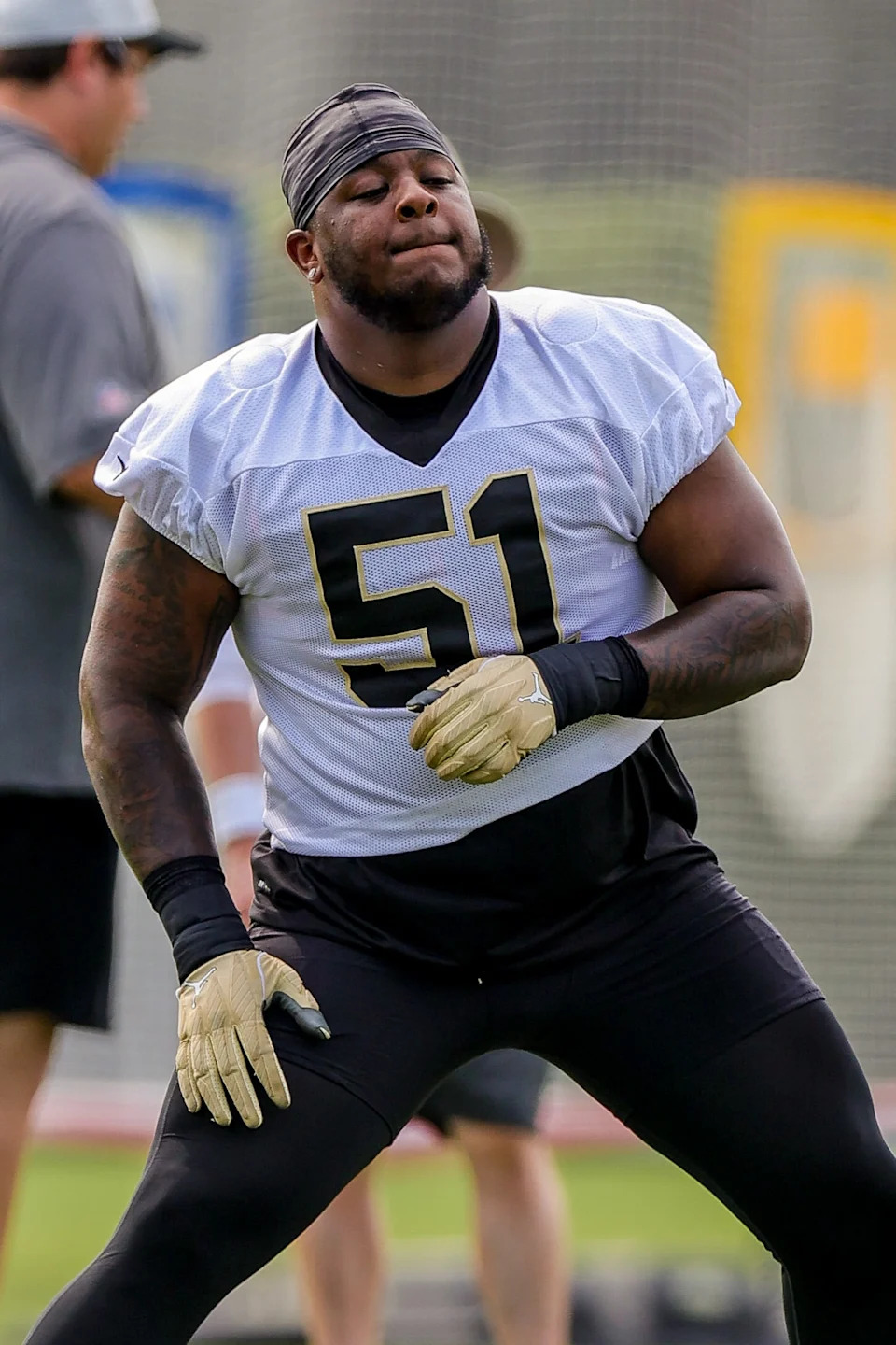 Jul 30, 2021; Metairie, LA, USA; New Orleans Saints center Cesar Ruiz (51) stretches during a New Orleans Saints training camp session at the New Orleans Saints Training Facility. Mandatory Credit: Stephen Lew-USA TODAY Sports