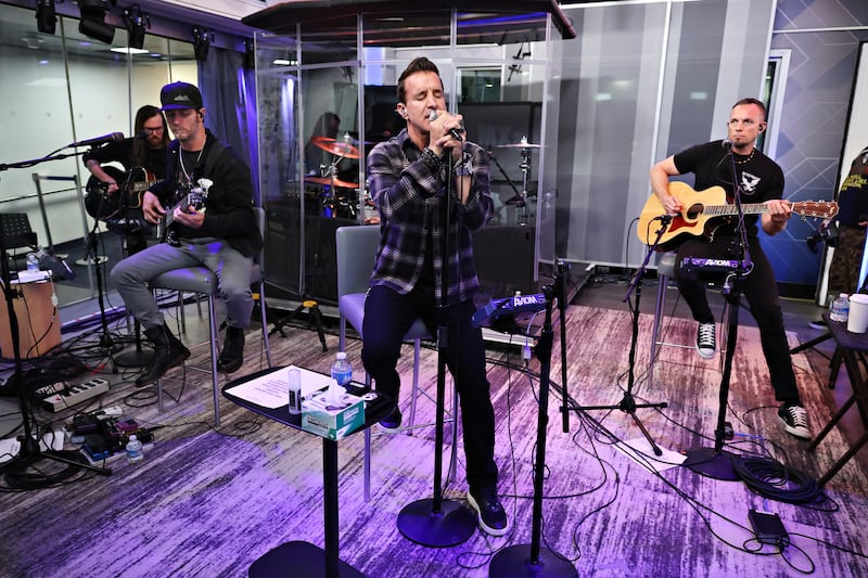 Eric Friedman, Brian Marshall, Scott Phillips, Scott Stapp and Mark Tremonti of Creed