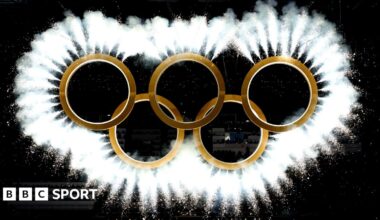 The Olympic rings come together as a fireworks display during the 2026 Winter Olympics opening ceremony in Milan-Cortina