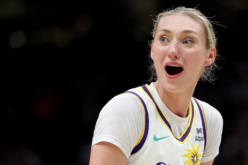 Cameron Brink of the Los Angeles Sparks looks on.