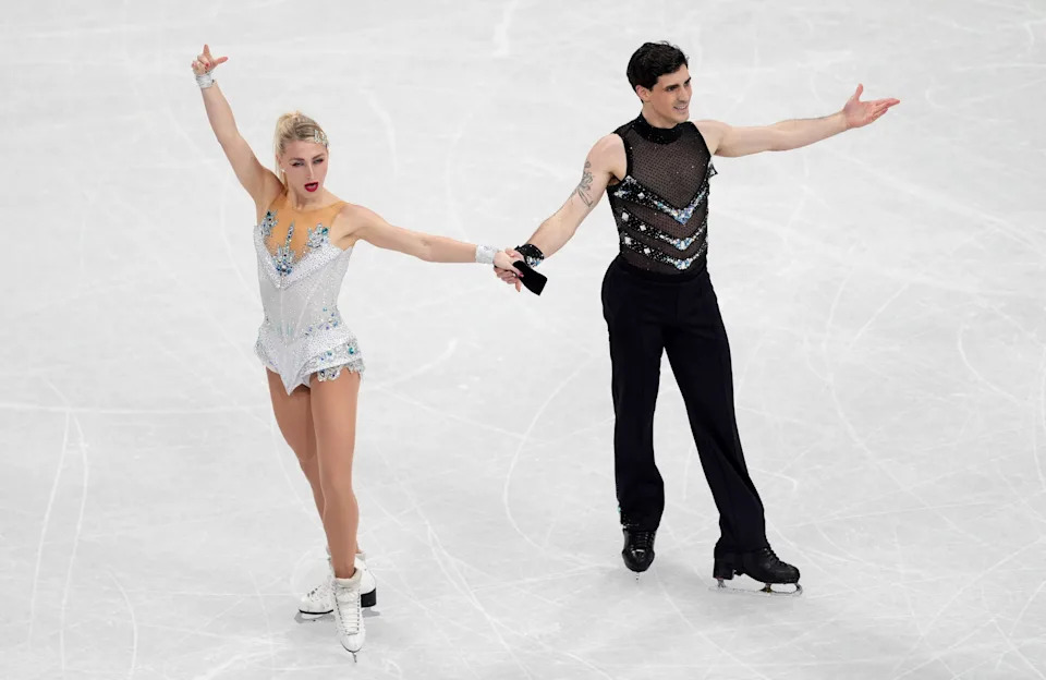 Feb 9, 2026; Milan, Italy; Piper Gilles and Paul Poirier of Canada skate during ice dancing at the Milano Cortina 2026 Olympic Winter Games at Milano Ice Skating Arena. Mandatory Credit: Amber Searls-Imagn Images
