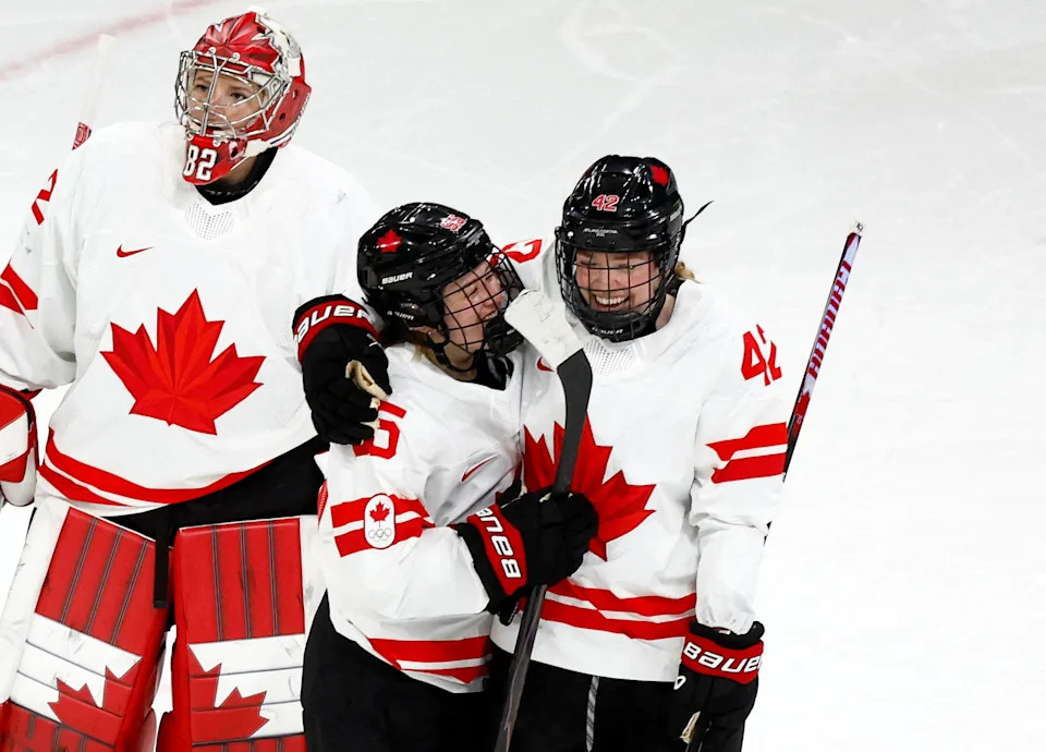 Milano Cortina 2026 Olympics - Ice Hockey - Women's Preliminary Round - Group A - Switzerland vs Canada - Milano Rho Ice Hockey Arena, Milan, Italy - February 07, 2026. Claire Thompson of Canada and Daryl Watts of Canada celebrate after the match against Switzerland REUTERS/Alessandro Garofalo     TPX IMAGES OF THE DAY