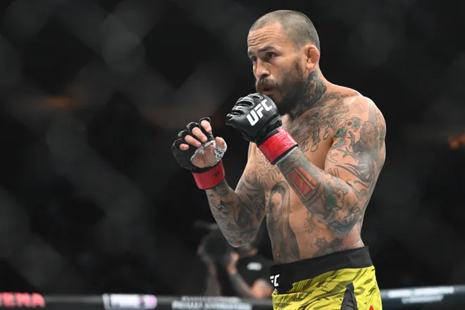 Oct 18, 2025; Vancouver, BC, CANADA; Marlon Vera (red gloves) fights Aiemann Zahabi (blue gloves) during UFC Fight Night at Rogers Arena. Mandatory Credit: Simon Fearn-Imagn Images