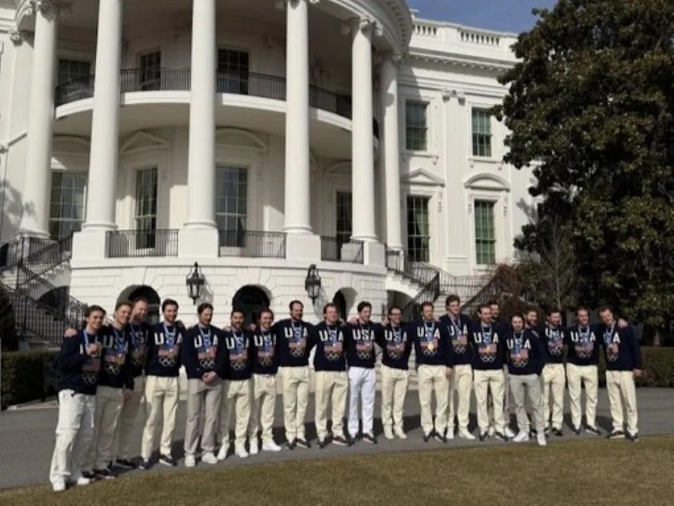  The U.S. men’s Olympic hockey team poses for a photo outside of the White House on Tuesday.