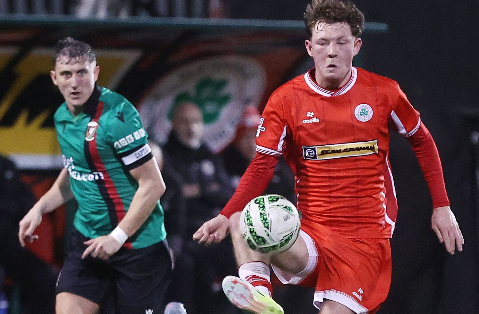 DERBY: Bernard Healy and Marcus Kane jostle for possession