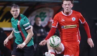 DERBY: Bernard Healy and Marcus Kane jostle for possession