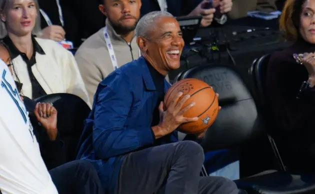 LOS ANGELES, CA - FEB 15: Former US President Barack Obama catches the ball during NBA All Star 2026 game between USA Stars and World team at Intuit Dome, Inglewood, Los Angeles, California, United States on February 15, 2026. (Photo by Tayfun Coskun/Anadolu via Getty Images)
