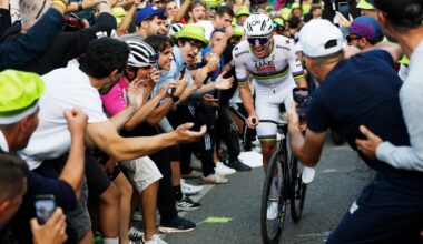 Tadej Pogacar surrounded by fans