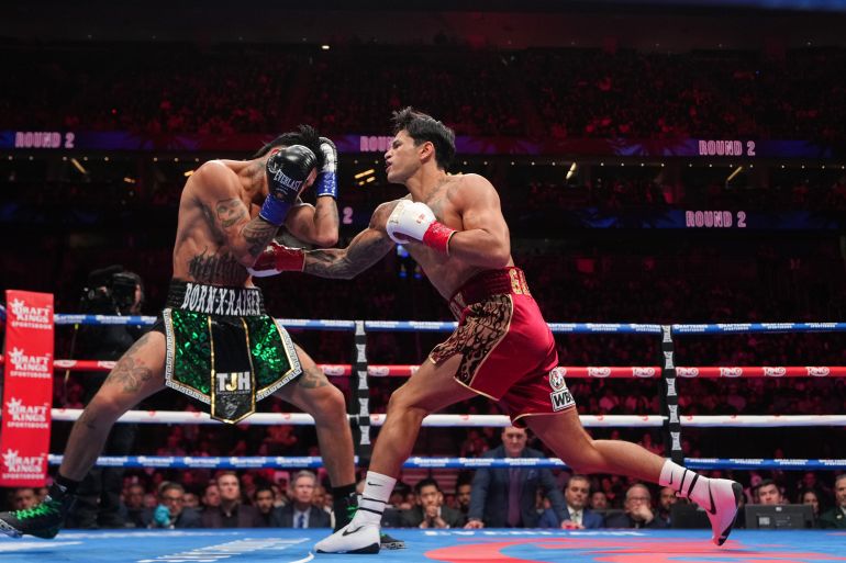 Ryan Garcia and Mario Barrios in action.