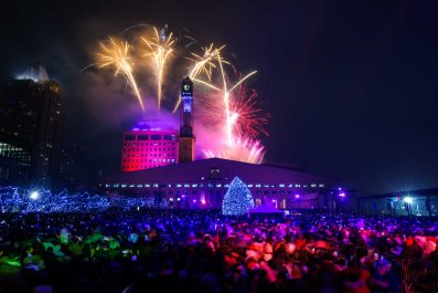 New Year’s Eve 2024 - fire works set off behind a building with a clock tower. 
