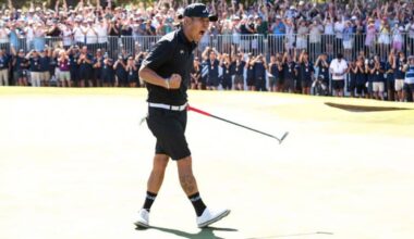 Anthony Kim of 4Aces GC reacts to his putt on the 18th green during the final round of the LIV Golf Adelaide at Grange Golf Club in Adelaide, Australia Sunday, Feb. 15, 2026. (Charles Laberge/LIV Golf via AP)