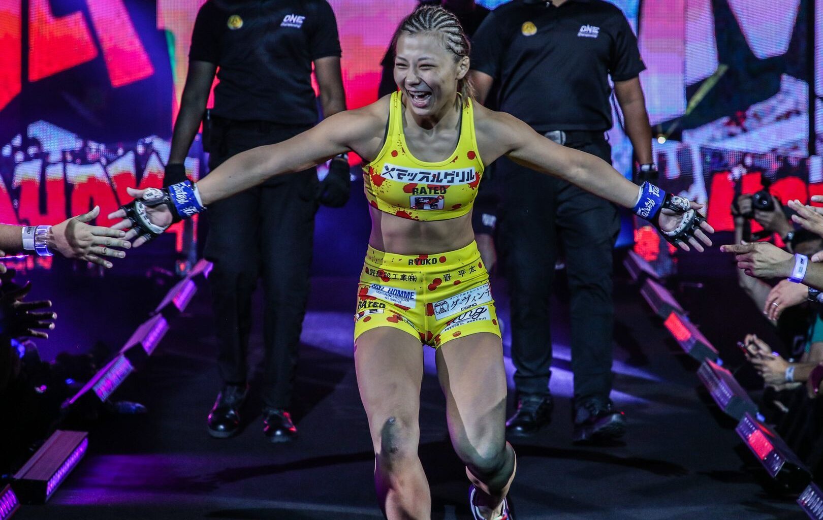 Japan's Ayaka Miura makes her way to the ring inside the Mall Of Asia Arena